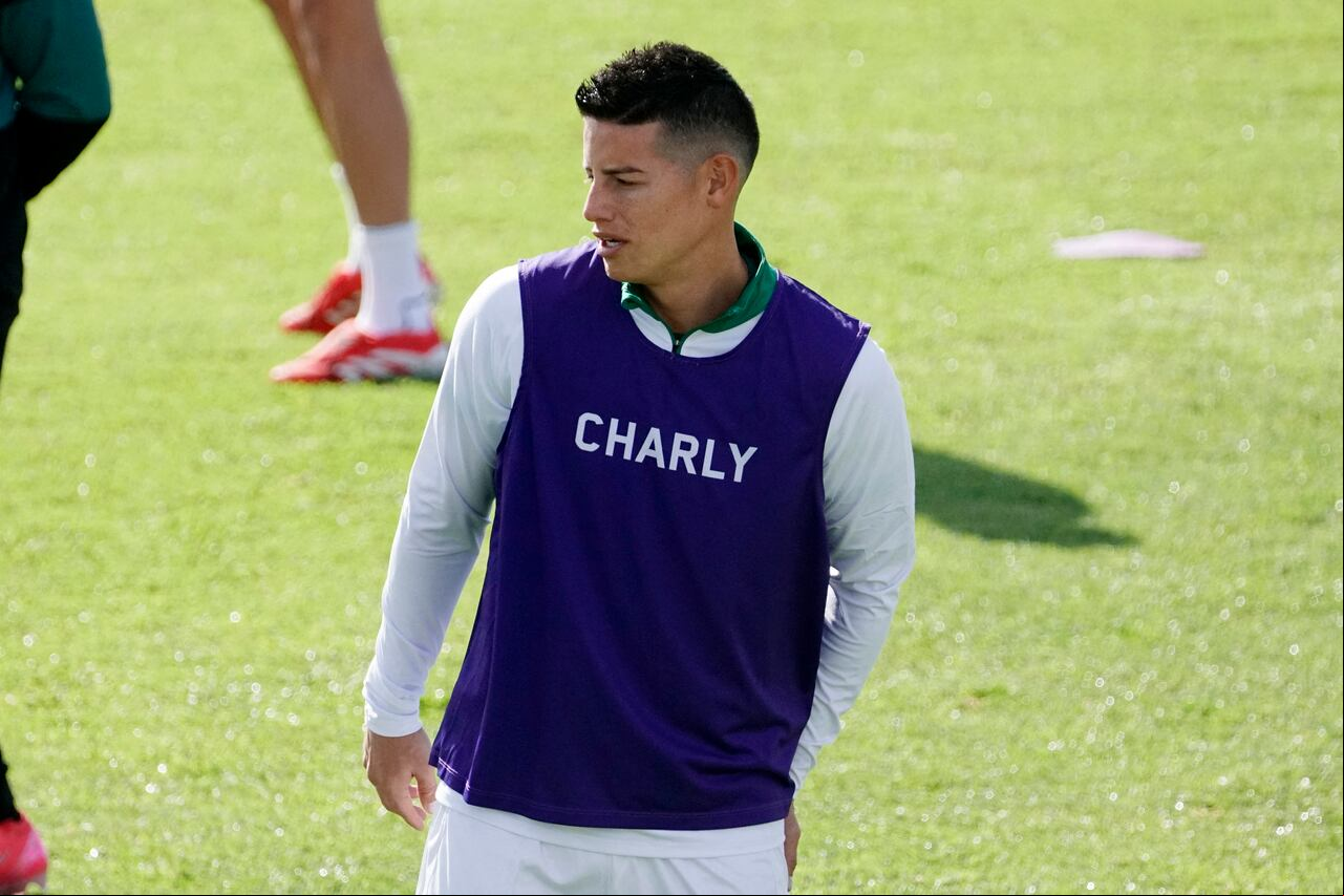 Colombian football player James Rodriguez looks on during a training session after g for Mexican football club Leon at their training grounds in Leon, Guanajuato state, Mexico, on January 14, 2025. Colombian football star James Rodriguez has signed for Mexican football Club Leon after his brief and unsuccessful spell at Spanish La Liga side Rayo Vallecano, the two clubs announced on January 13. (Photo by MARIO ARMAS / AFP)