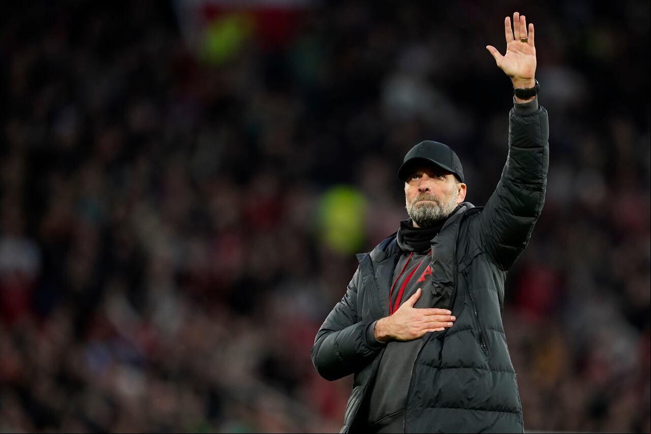 Liverpool's manager Jurgen Klopp greets ers after the FA Cup quarterfinal soccer match between Manchester United and Liverpool at the Old Trafford stadium in Manchester, England, Sunday, March 17, 2024. Manchester United won 4-3. (AP Photo/Dave Thompson)