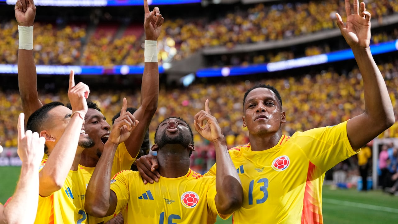 Colombia's Jefferson Lerma, 16, celebrates scoring his side's second goal against Paraguay during a Copa America Group D soccer match in Houston, Texas, Monday, June 24, 2024. (AP Photo/Kevin M. Cox)