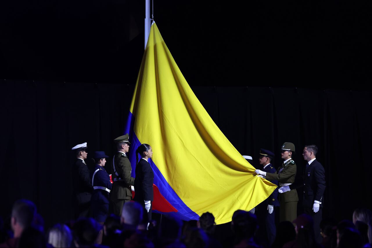 SANTIAGO, CHILE - NOVEMBER 05: Colombian flag is raised during the Closing Ceremony of Santiago 2023 Pan Am Games at Estadio Bicentenario de La Florida on November 05, 2023 in Santiago, Chile. Barranquilla will host the next edition of the Pan Am Games in 2027. (Photo by Ezra Shaw/Getty Images)