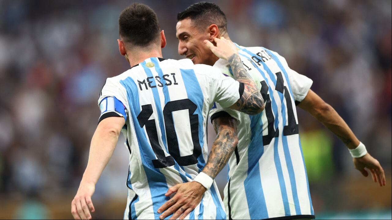 Soccer Football - FIFA World Cup Qatar 2022 - Final - Argentina v - Lusail Stadium, Lusail, Qatar - December 18, 2022 Argentina's Lionel Messi celebrates scoring their first goal with Angel Di Maria REUTERS/Carl Recine
