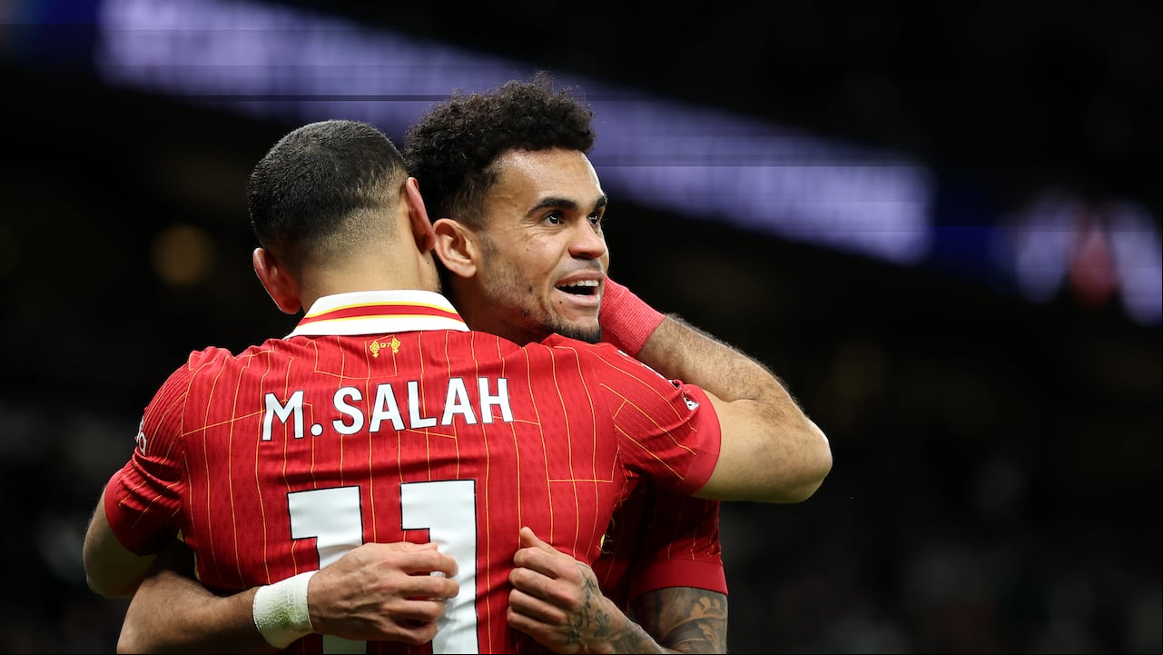 LONDON, ENGLAND - DECEMBER 22: Luis Diaz of Liverpool celebrates scoring his sides sixth goal with team mate Mohamed Salah during the Premier League match between Tottenham Hotspur FC and Liverpool FC at Tottenham Hotspur Stadium on December 22, 2024 in London, England. (Photo by Alex Pantling/Getty Images)