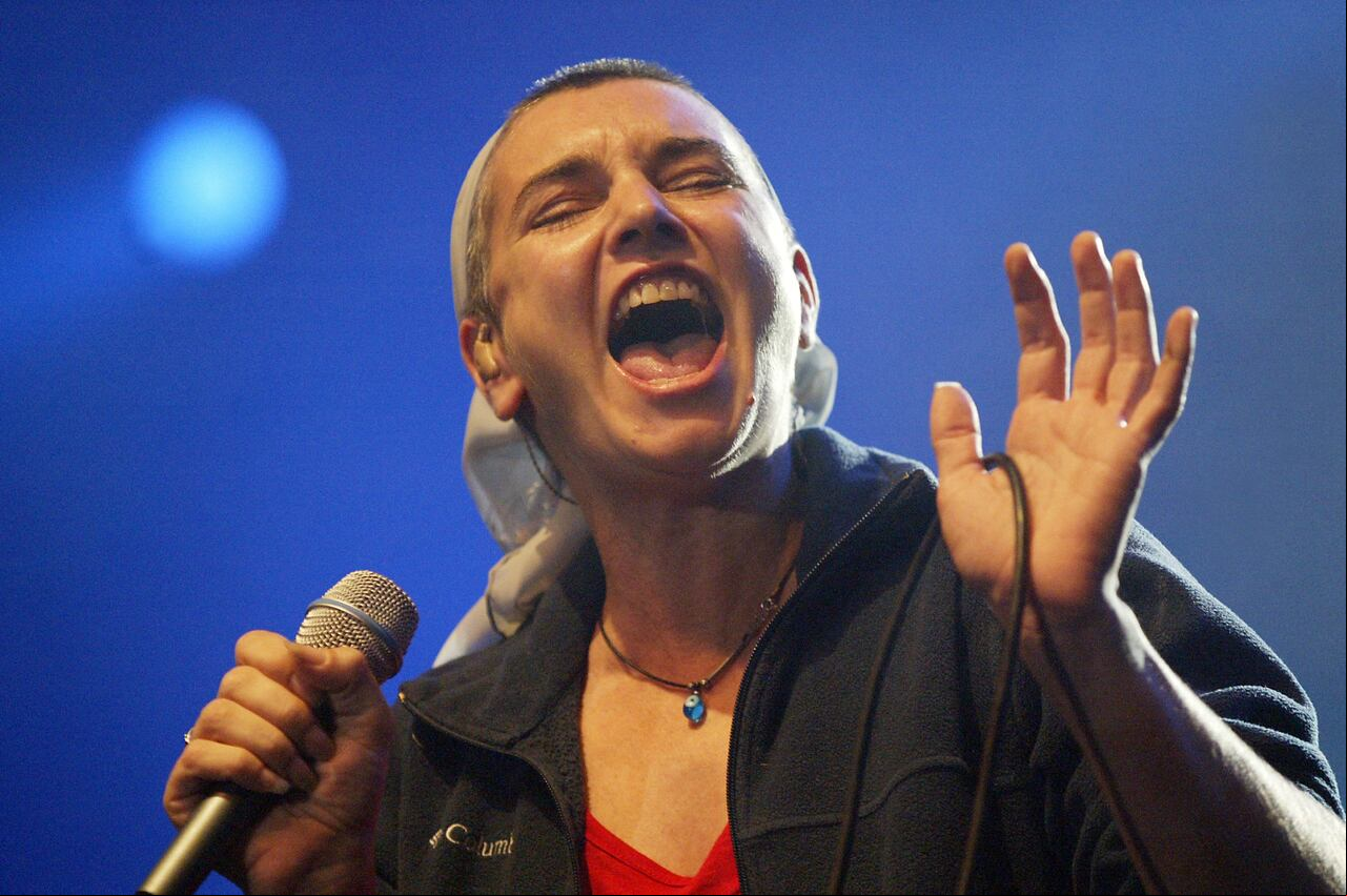 (FILES) Irish singer Sinead O'Connor performs at the Highline Ballroom in New York City on February 23, 2012. Irish pop singer Sinead O'Connor, who shot to fame in the 1990s, has died at the age of 56, Irish media reported on July 26, 2023. In a statement her family said it was with "great sadness that we announce the ing of our beloved Sinead. Her family and friends are devastated and have requested privacy at this very difficult time," Irish national broadcaster RTE reported. (Photo by Jason Kempin / GETTY IMAGES NORTH AMERICA / AFP)
