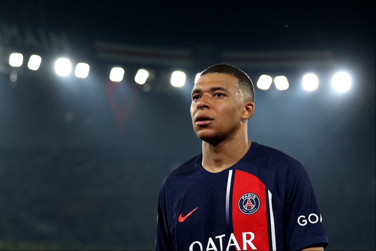 PARIS, - MAY 07: Kylian Mbappe of Paris Saint-Germain looks dejected as he leaves the field after defeat to Borussia Dortmund during the UEFA Champions League semi-final second leg match between Paris Saint-Germain and Borussia Dortmund at Parc des Princes on May 07, 2024 in Paris, . (Photo by Richard Heathcote/Getty Images)