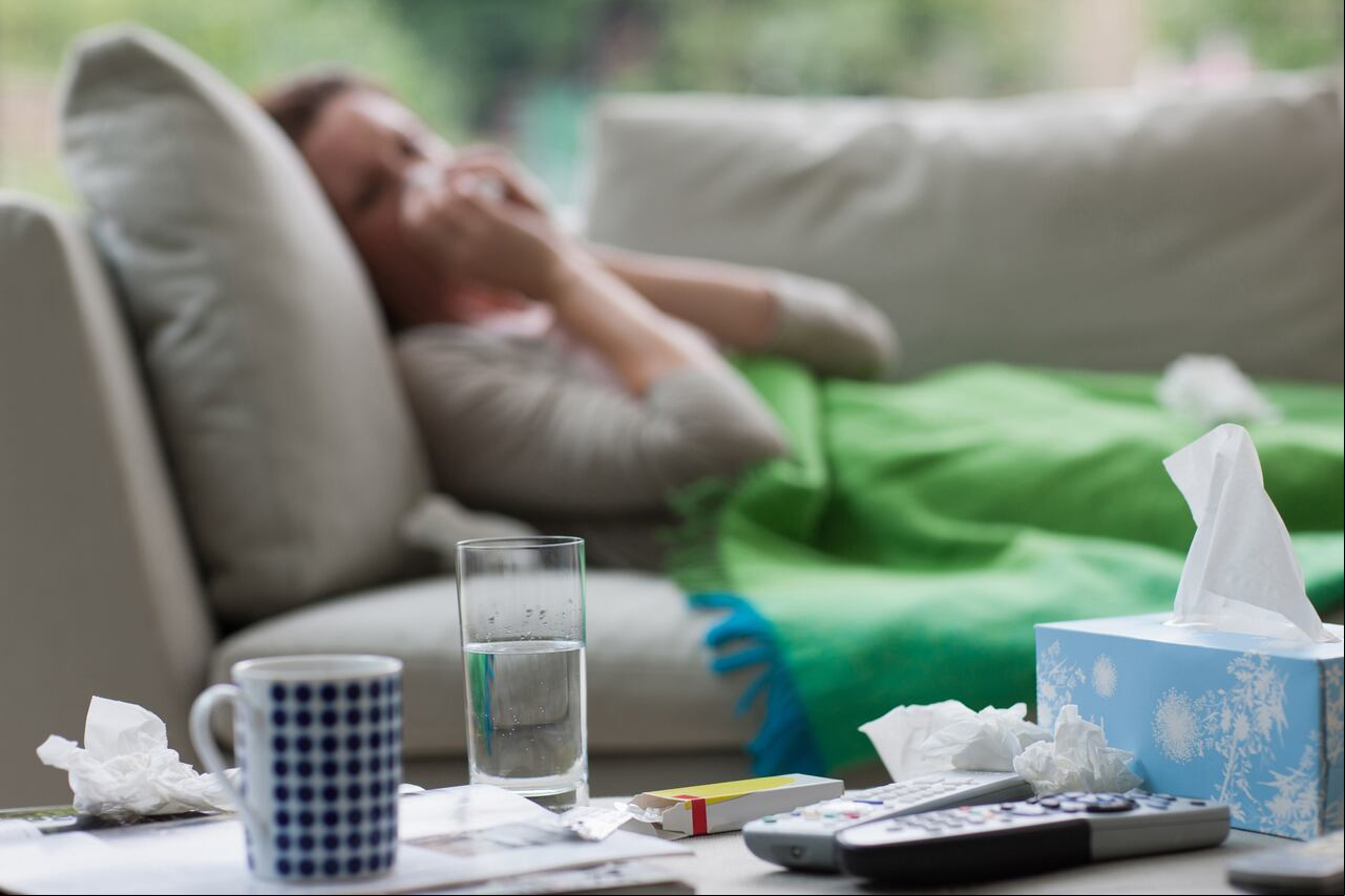 Foto de referencia sobre una mujer con gripe