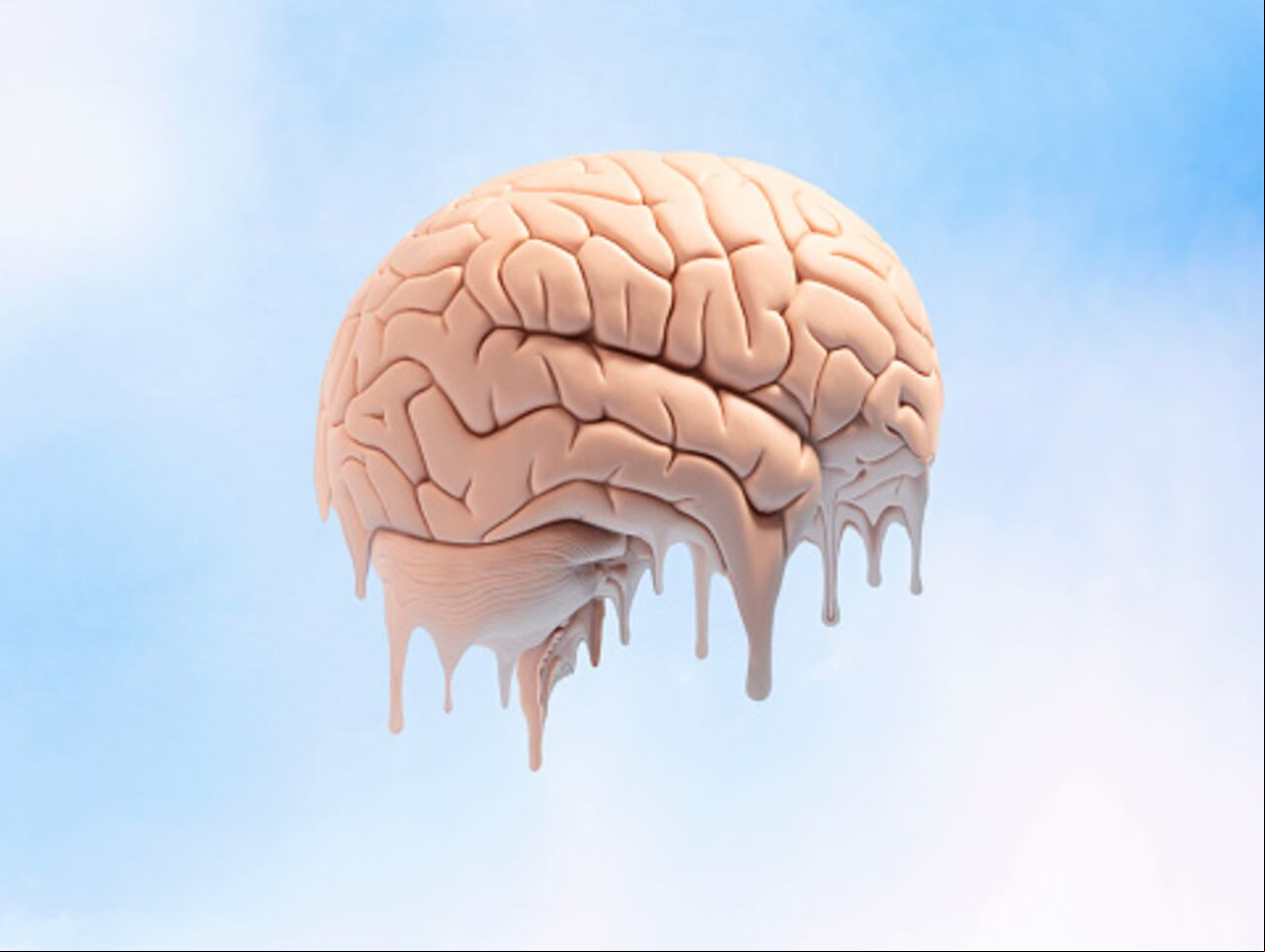 Side view of human brain model in mid air on blue sky background melting from the bottom
