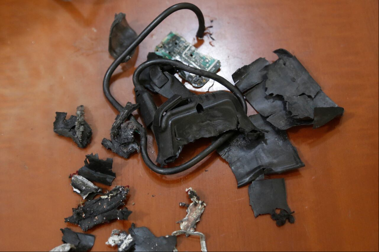 A photo taken on September 18, 2024, in Beirut's southern suburbs shows the remains of exploded pagers on display at an undisclosed location. Hundreds of pagers used by Hezbollah exploded across Lebanon on September 17, killing at least nine people and wounding around 2,800 in blasts the Iran-backed militant group blamed on Israel. (Photo by AFP)