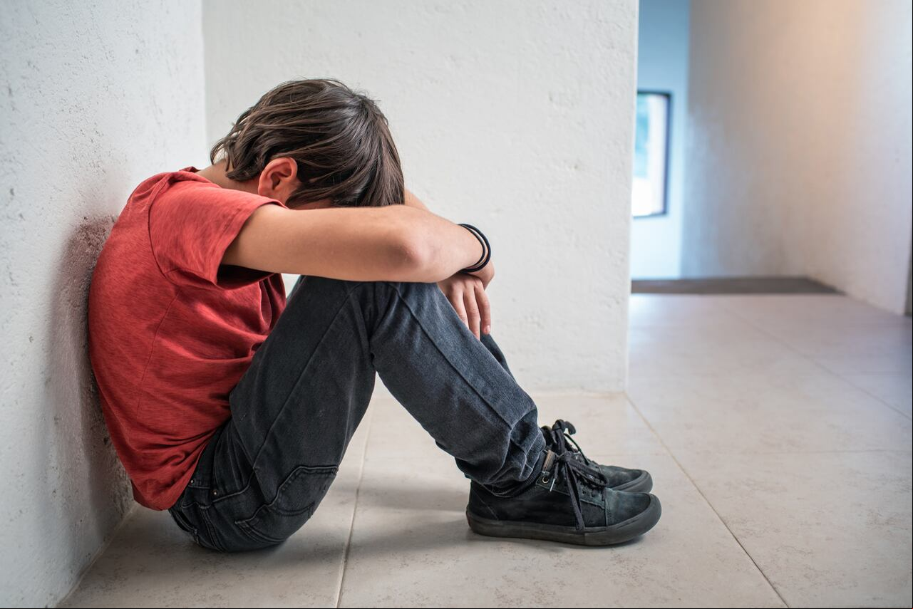 Niño deprimido