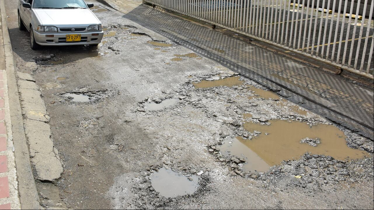 vias en mal estado Cali