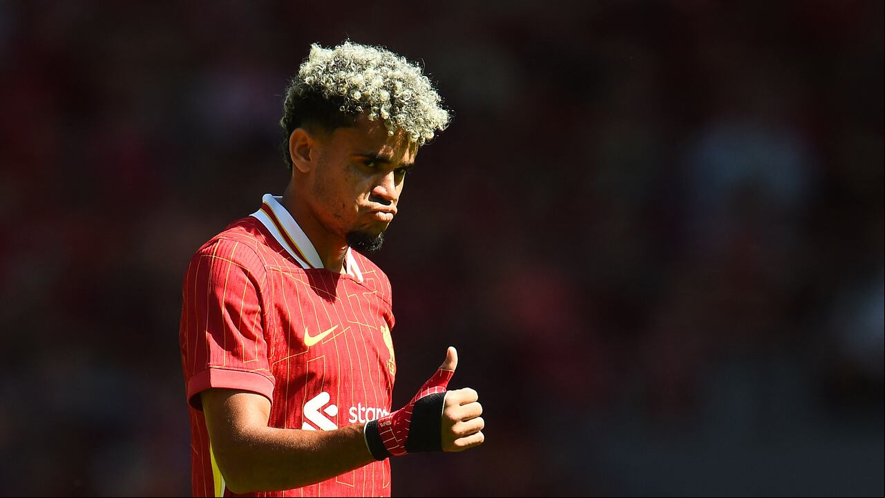 Liverpool's Colombian midfielder #07 Luis Diaz reacts during the pre-season friendly football match between Liverpool and Sevilla at Anfield stadium in Liverpool, northwest England on August 11, 2024. (Photo by Peter POWELL / AFP)