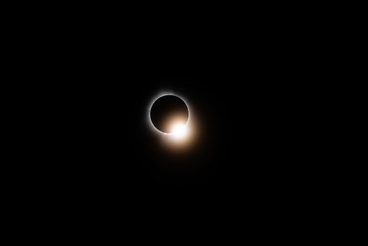 WAPAKONETA, OHIO - APRIL 8: The sun and the moon align completely during the total solar eclipse on April 8, 2024 in Wapakoneta, Ohio. Totality lasted for alomst four minutes in Ohio. Millions of people have flocked to areas across North America that are in the "path of totality" in order to experience a total solar eclipse. During the event, the moon will in between the sun and the Earth, appearing to block the sun. (Photo by Matthew Hatcher/Getty Images)