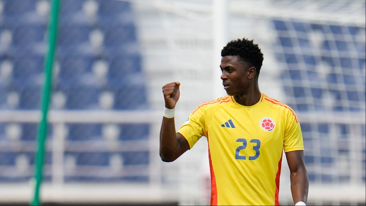 Colombia's Neiser Villarreal celebrates scoring his side's opening goal against Uruguay during a South American U-20 Championship final round soccer match in Puerto La Cruz, Venezuela, Sunday, Feb. 16, 2025. (AP Photo/Matias Delacroix)