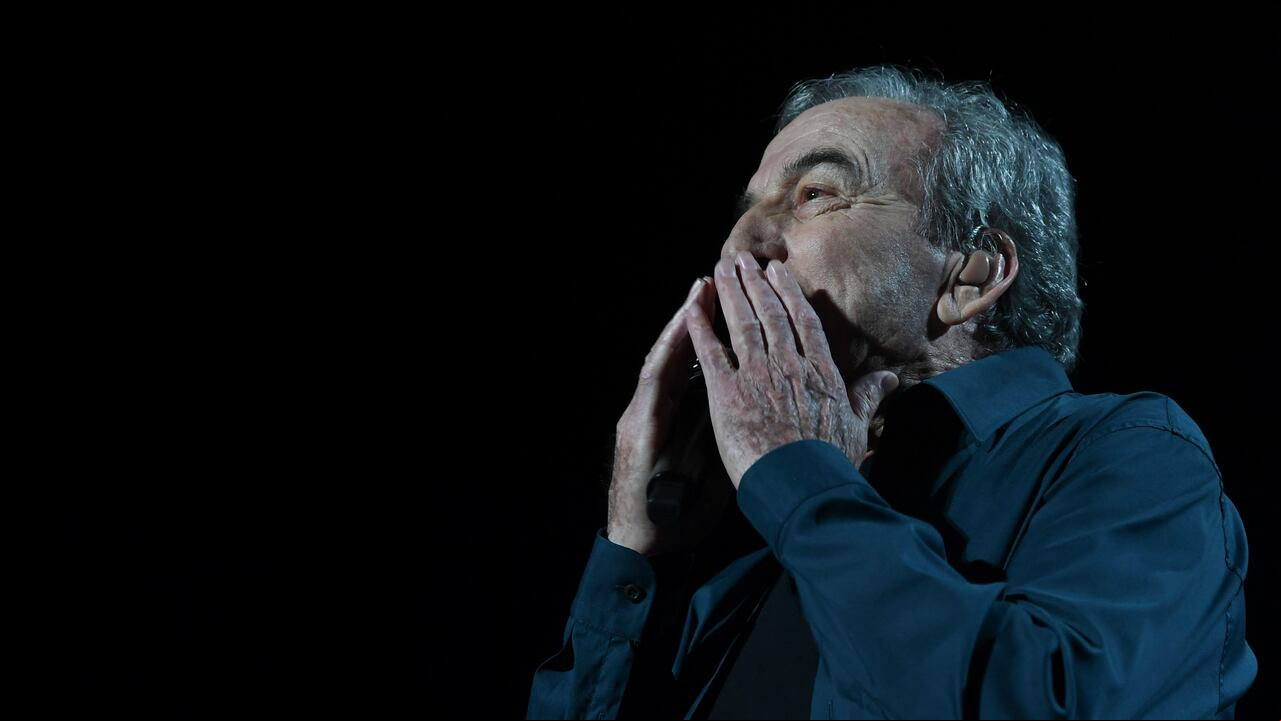 Spanish singer Jose Luis Perales performs during the last concert of his career in Montevideo, on April 24, 2022. (Photo by PABLO PORCIUNCULA / AFP)